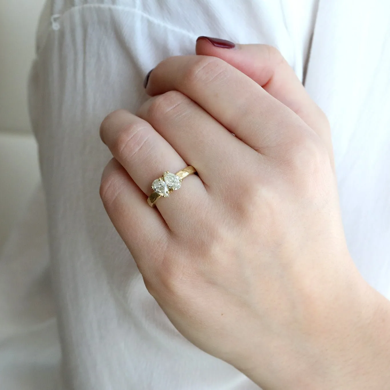 18 Karat Yellow Gold Hammered Band with Two Pear Shaped Diamonds