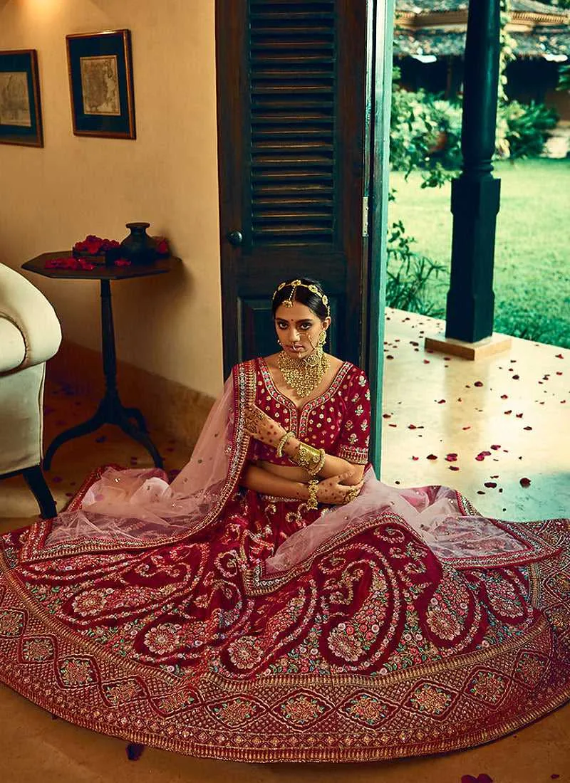 Maroon And Gold Heavy Embroidered Velvet Lehenga Choli