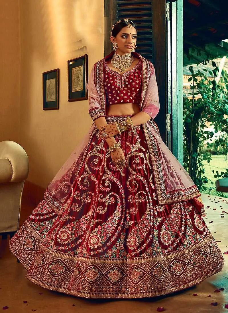 Maroon And Gold Heavy Embroidered Velvet Lehenga Choli