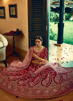 Maroon And Gold Heavy Embroidered Velvet Lehenga Choli
