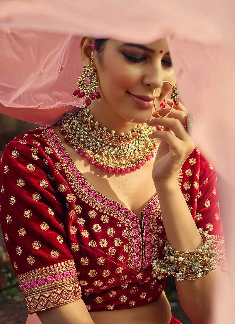 Maroon And Gold Heavy Embroidered Velvet Lehenga Suit