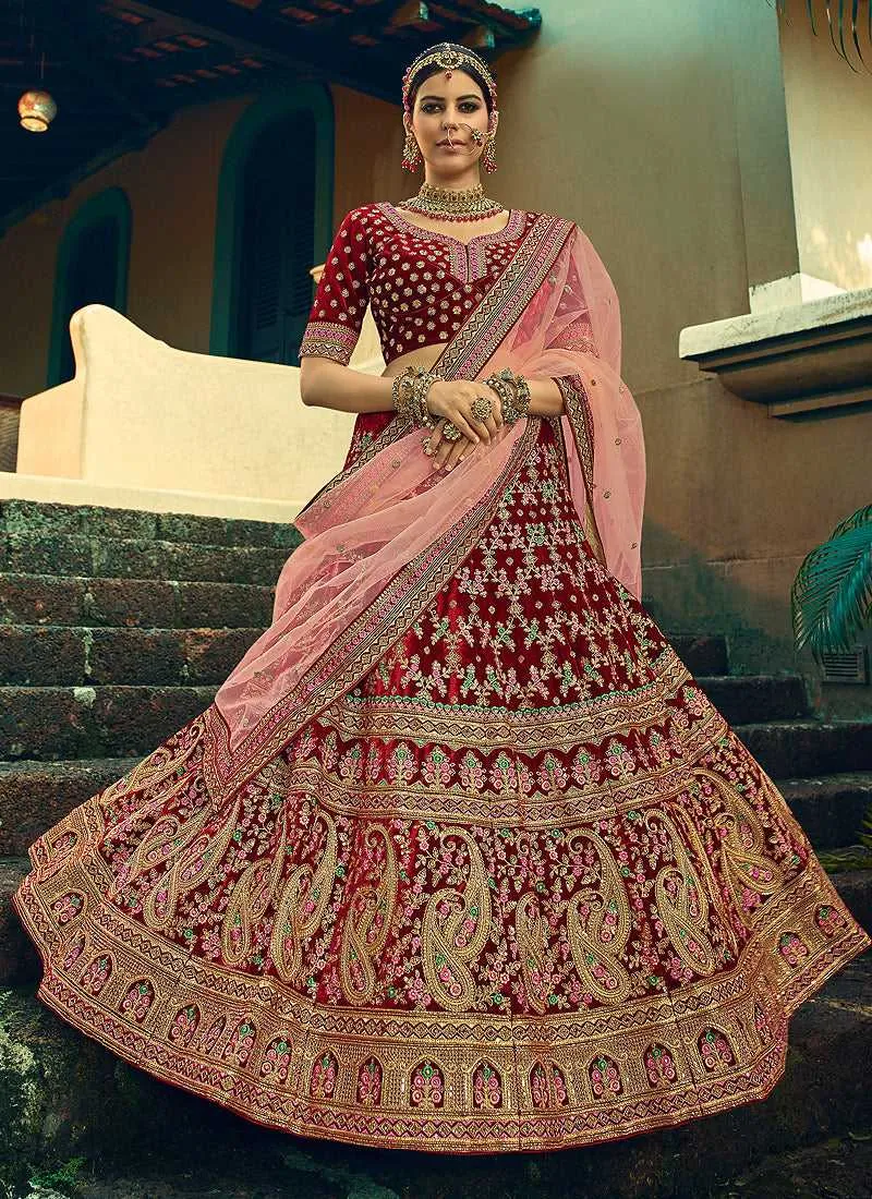 Maroon And Gold Heavy Embroidered Velvet Lehenga Suit