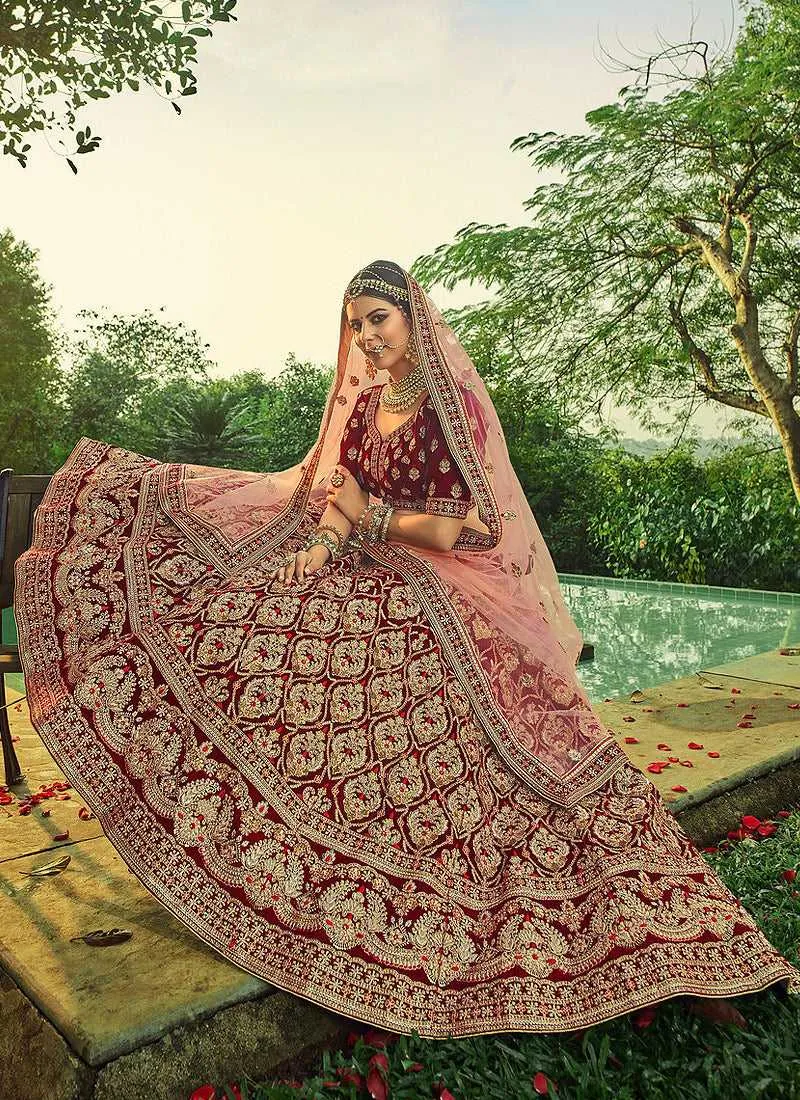 Maroon And Gold Heavy Embroidered Velvet Lehenga Suit