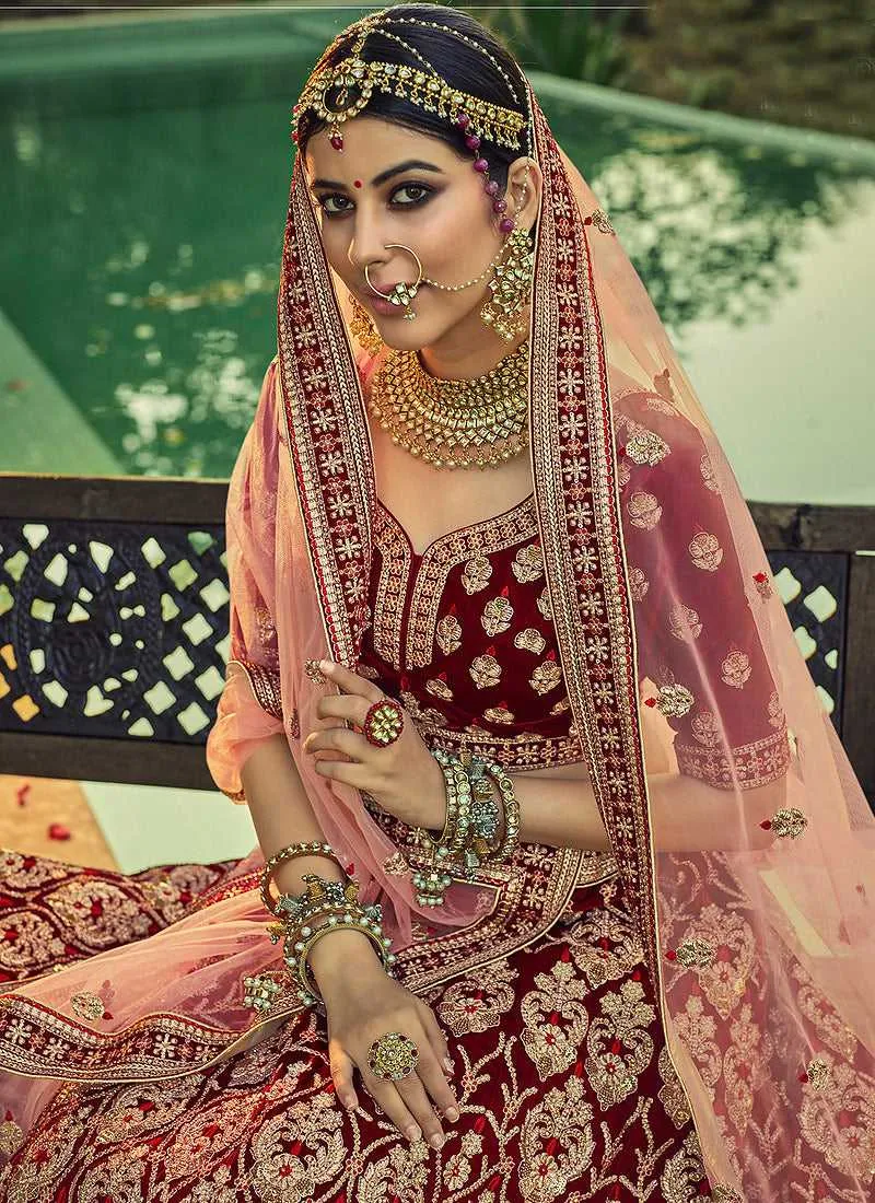 Maroon And Gold Heavy Embroidered Velvet Lehenga Suit