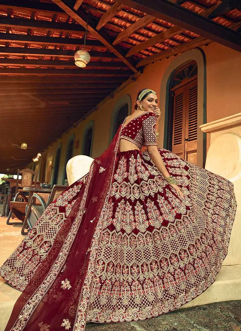 Maroon And Gold Heavy Embroidered Velvet Lehenga