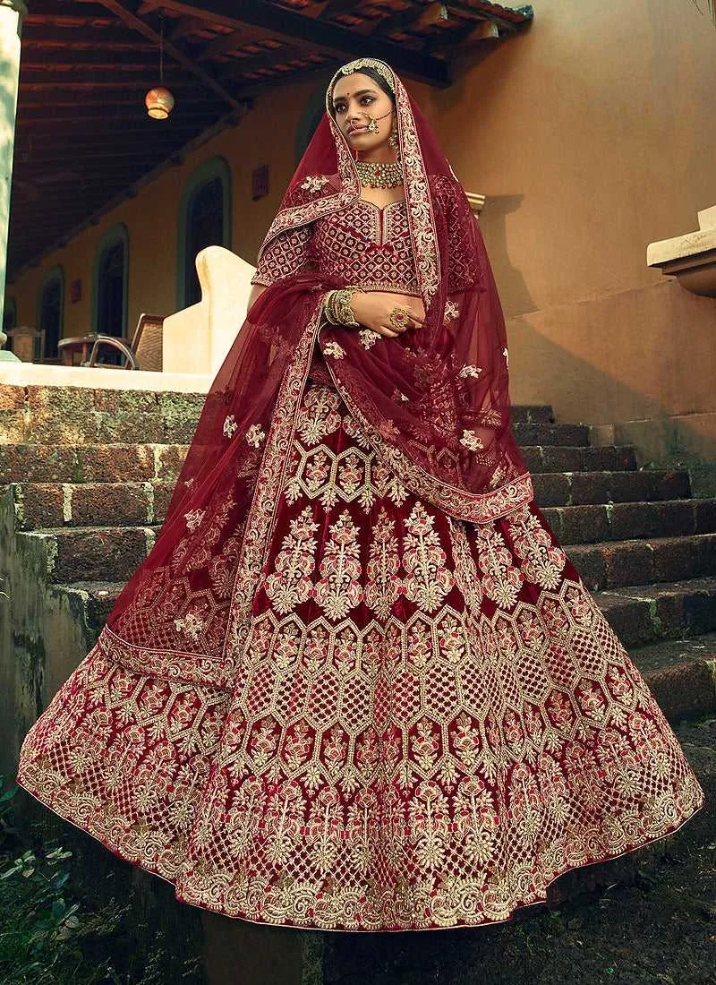 Maroon And Gold Heavy Embroidered Velvet Lehenga