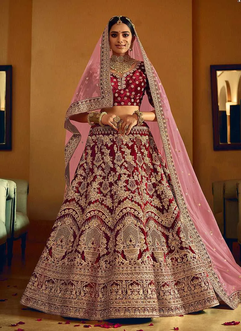 Maroon And Gold Heavy Embroidered Velvet Lehenga