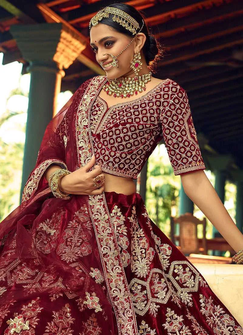 Maroon And Gold Heavy Embroidered Velvet Lehenga