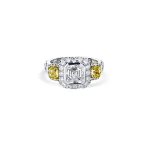 Platinum Emerald Cut Diamond Engagement Ring With Cushion Side Yellow Diamond And Halo